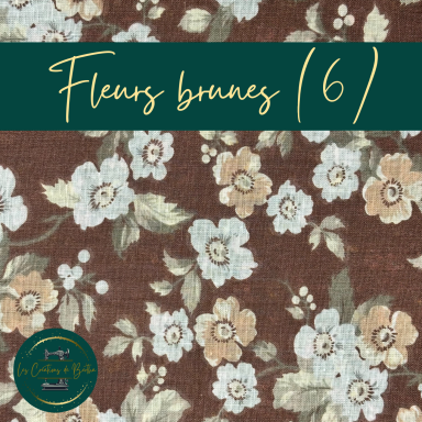 Motif floral avec fleurs jaunes et bleues sur fond marron.